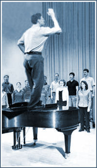 Student teacher on top of piano